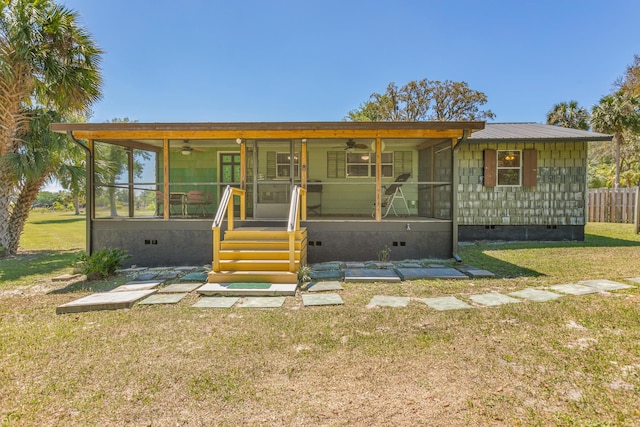 view of front of property featuring crawl space, a front yard, and ceiling fan
