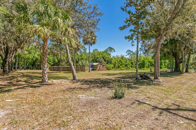 view of yard featuring fence
