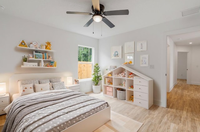 bedroom featuring ceiling fan and light wood-type flooring