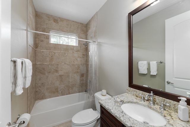 full bathroom featuring vanity, toilet, and shower / bathtub combination with curtain