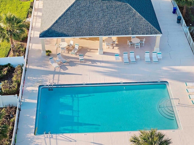 980 Windward Way, Saint Augustine, FL 32080 - community pool featuring a patio, outdoor dining space, and fence