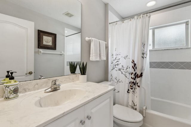 full bath with toilet, visible vents, shower / bath combination with curtain, and vanity