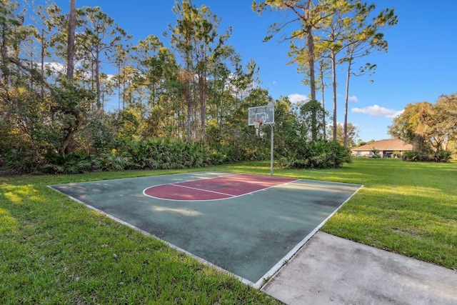 view of basketball court featuring community basketball court and a yard