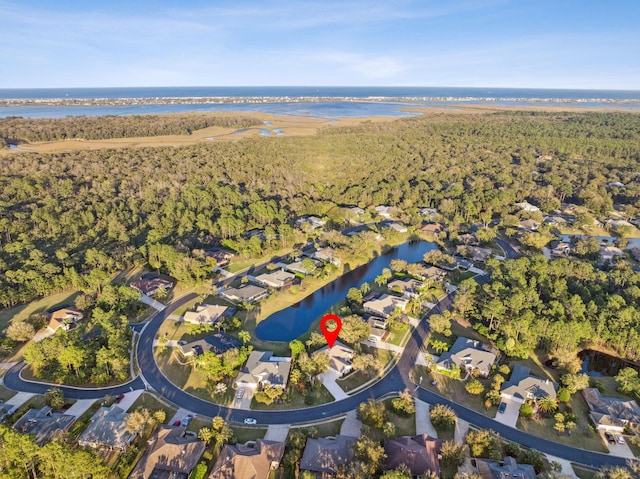 aerial view featuring a residential view and a water view