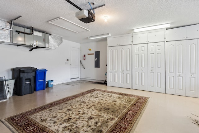 garage featuring a garage door opener and electric panel