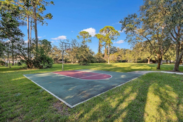 view of basketball court featuring community basketball court and a yard