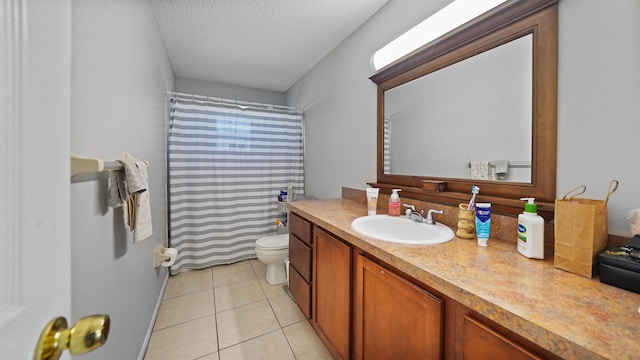 bathroom featuring curtained shower, a textured ceiling, tile patterned floors, vanity, and toilet