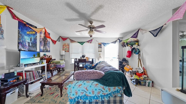 tiled living room featuring ceiling fan and a textured ceiling