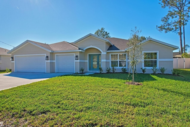 ranch-style house with a front lawn and a garage