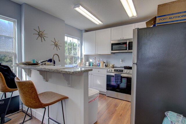 5961 S A1A, Saint Augustine, FL 32080 - empty room with dark wood-style flooring and a textured ceiling