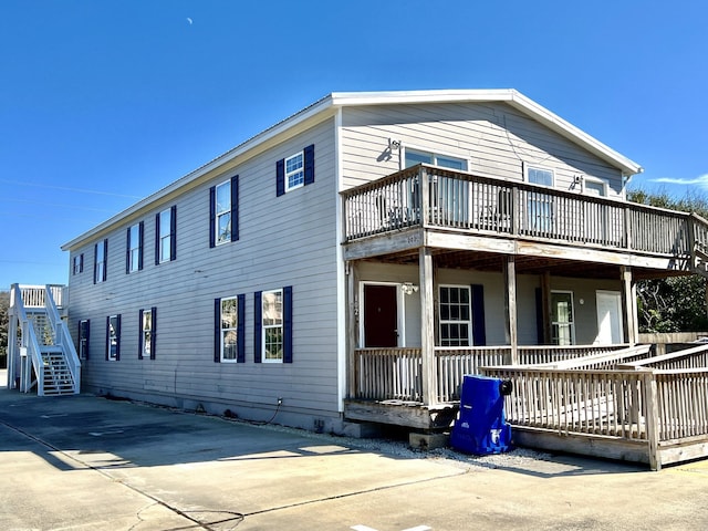 5961 S A1A, Saint Augustine, FL 32080 - view of front of property featuring covered porch and a balcony