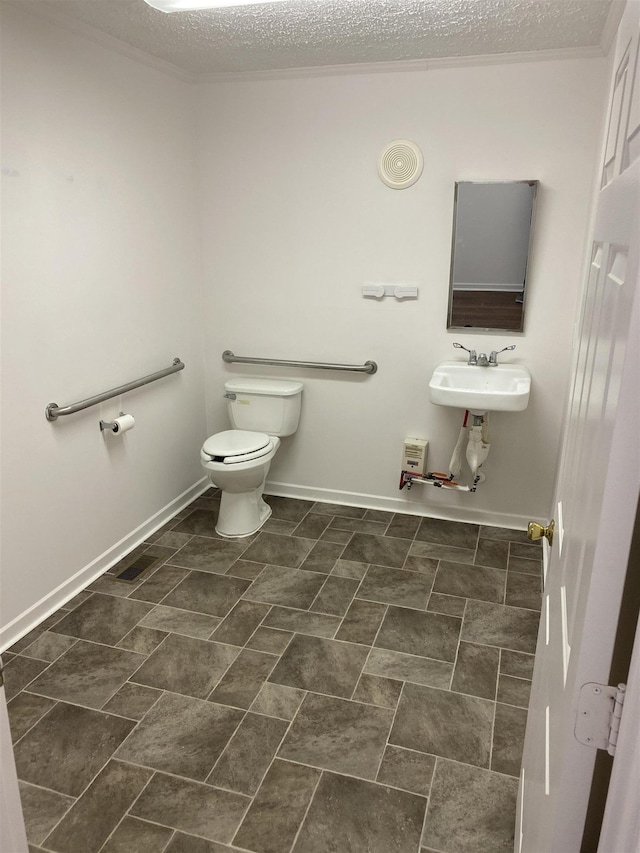 5961 S A1A, Saint Augustine, FL 32080 - bathroom with toilet and a textured ceiling
