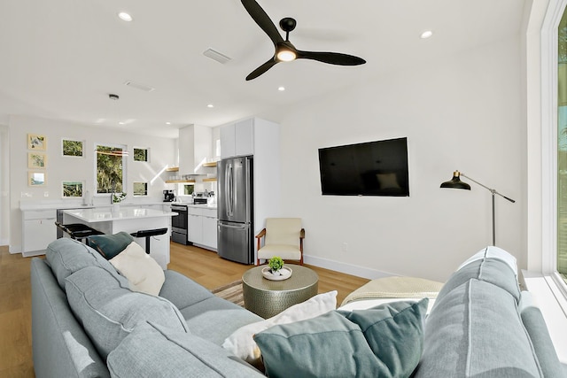 194 Riberia St, Saint Augustine, FL 32084 - living area with a ceiling fan, light wood-type flooring, and recessed lighting