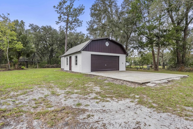 garage with a lawn