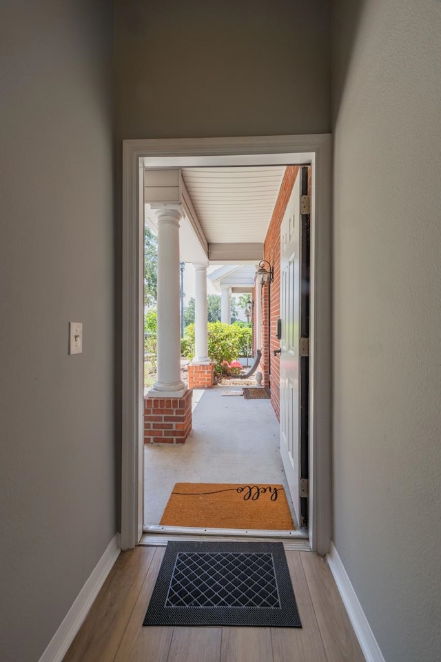 entryway with light hardwood / wood-style floors