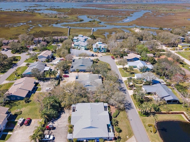 aerial view featuring a water view and a residential view