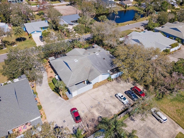 aerial view featuring a water view and a residential view