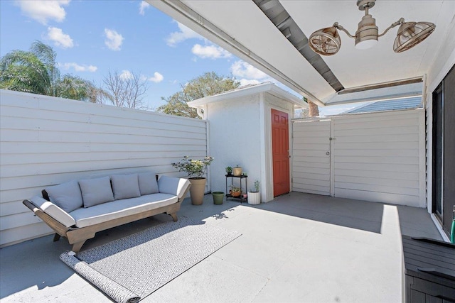 view of patio / terrace with a fenced backyard and an outdoor living space