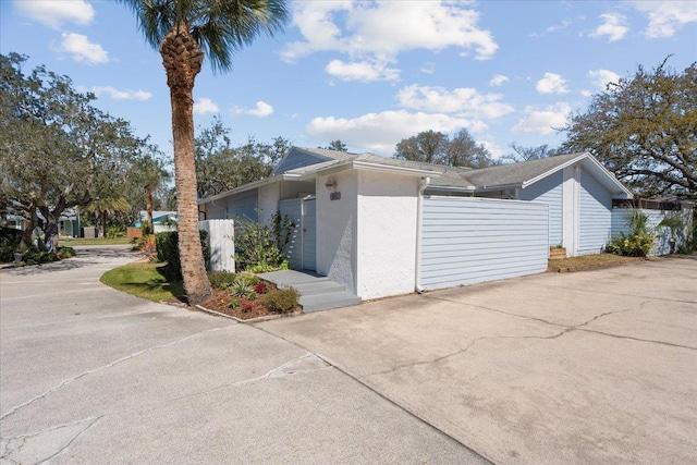 view of home's exterior with stucco siding