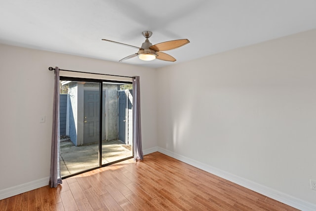 spare room featuring ceiling fan and light hardwood / wood-style flooring