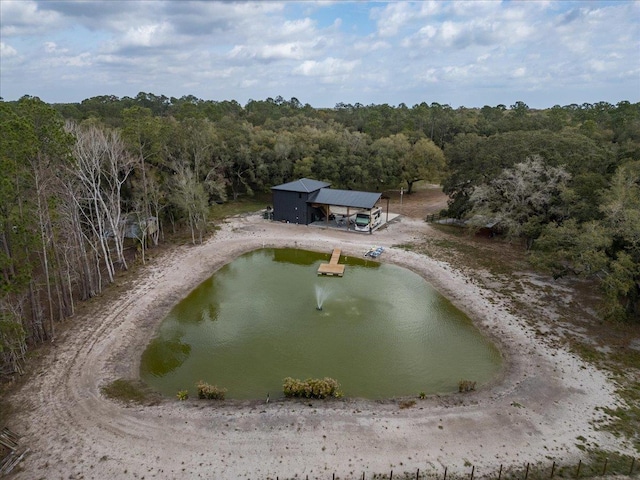 drone / aerial view with a view of trees