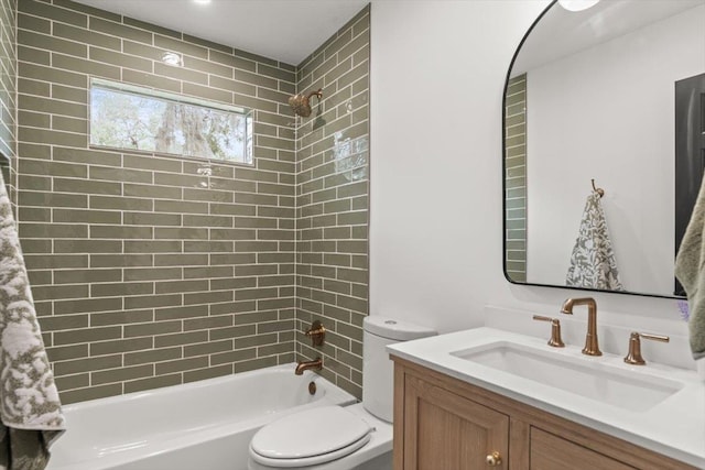 bathroom featuring toilet, vanity, and  shower combination