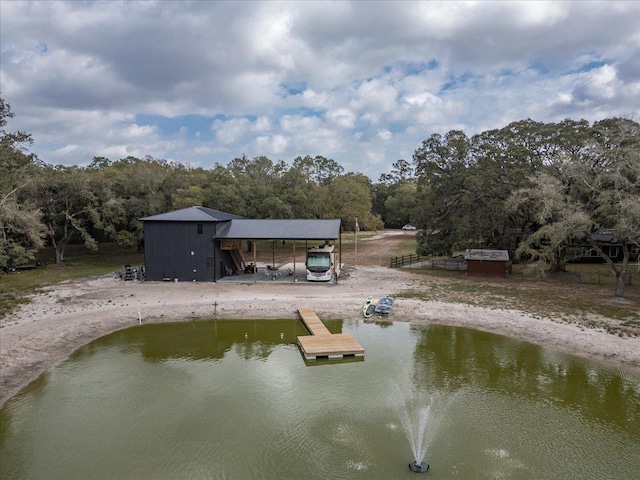 dock area featuring a water view