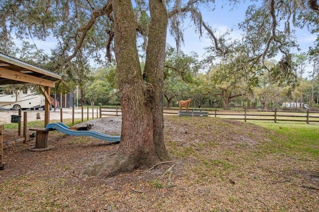 view of yard featuring playground community