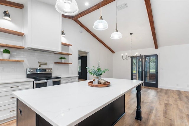 kitchen featuring open shelves, beam ceiling, stainless steel range with electric stovetop, and white cabinetry