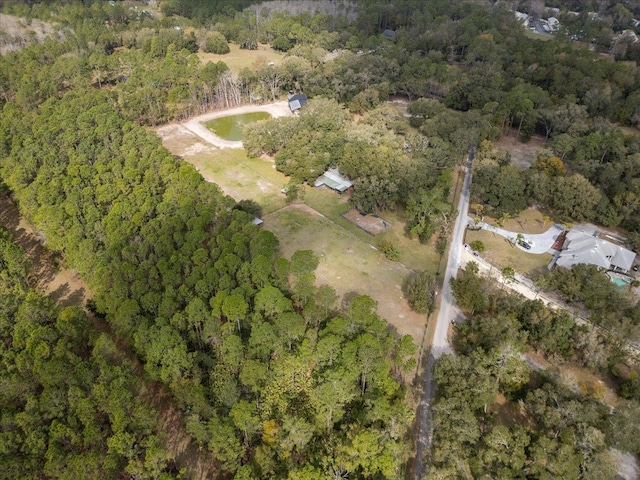 aerial view featuring a view of trees