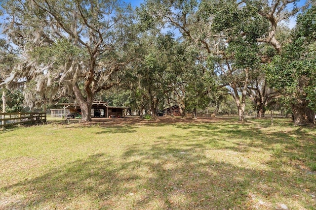 view of yard featuring fence