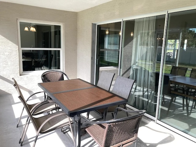 52 Fanshawe Ln, Palm Coast, FL 32137 - balcony with outdoor dining area
