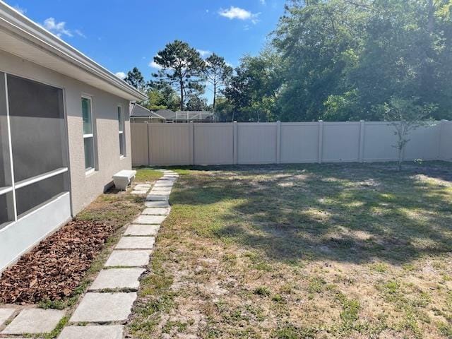 view of yard featuring a fenced backyard