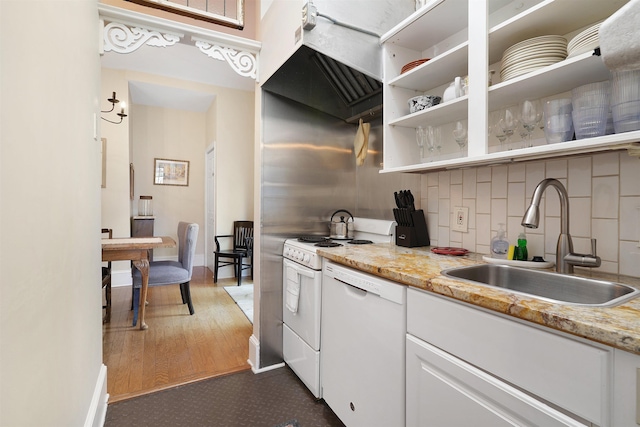 7 Cincinnati Ave, Saint Augustine, FL 32084 - kitchen featuring white appliances, tasteful backsplash, white cabinets, range hood, and open shelves