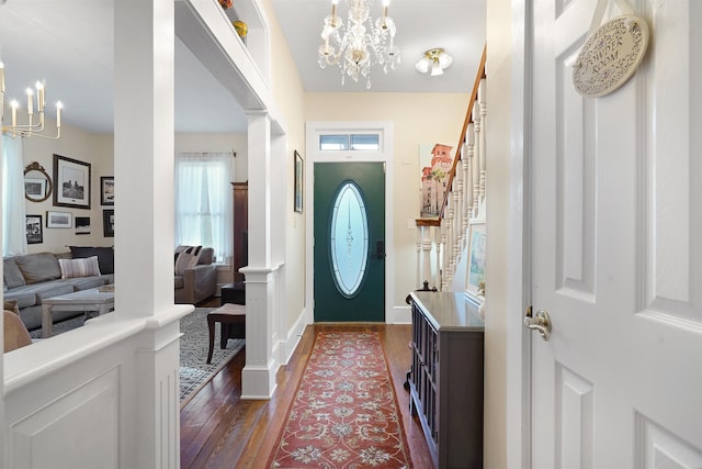 7 Cincinnati Ave, Saint Augustine, FL 32084 - entrance foyer featuring a chandelier and dark wood-style floors