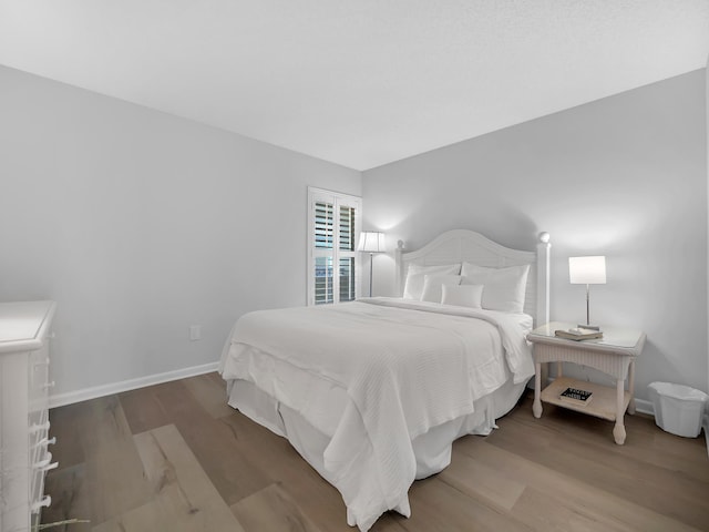 850 A1A Beach Blvd Unit 74, Saint Augustine Beach, FL 32080 - bedroom with wood finished floors and baseboards