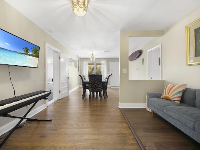 1221 A1A S, Saint Augustine, FL 32080 - living area featuring a chandelier and dark wood-style flooring