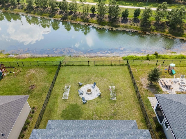 birds eye view of property featuring a water view