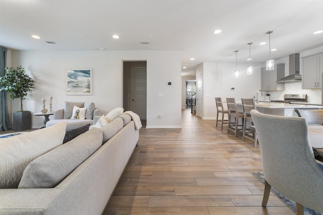 living room featuring light wood-type flooring