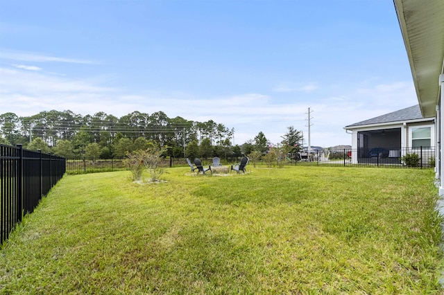 view of yard featuring a fire pit