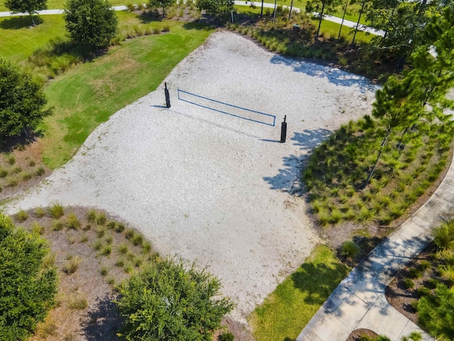 view of property's community featuring volleyball court