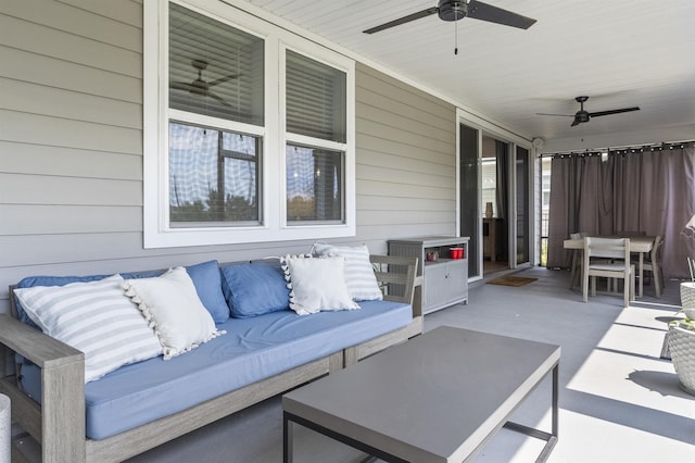 view of patio featuring an outdoor hangout area and ceiling fan