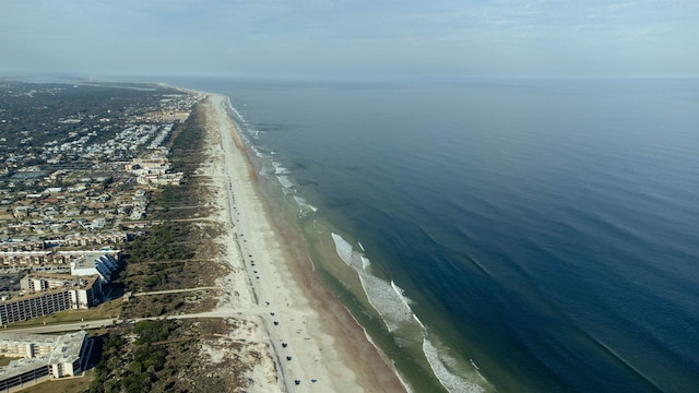 aerial view with a beach view and a water view