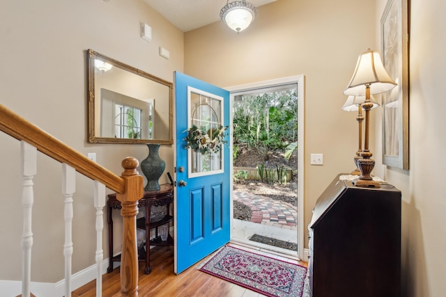 entrance foyer featuring hardwood / wood-style flooring