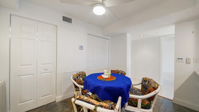 1 John Anderson Dr Unit 218, Ormond Beach, FL 32176 - dining area featuring baseboards and a ceiling fan