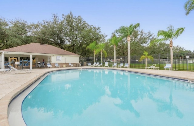 view of pool featuring a patio