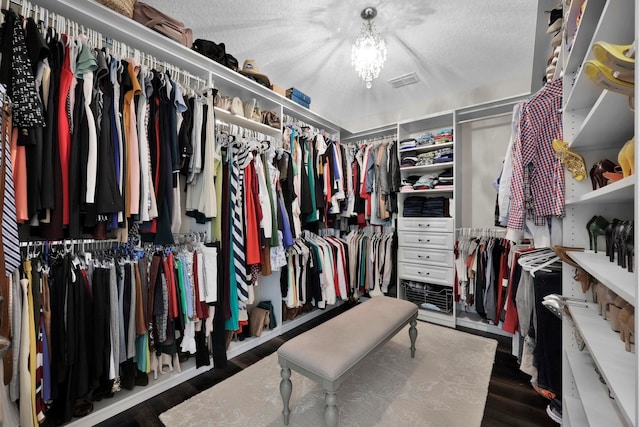 2790 Las Calinas Blvd, Saint Augustine, FL 32095 - spacious closet with wood finished floors and a chandelier