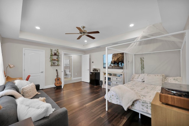 2790 Las Calinas Blvd, Saint Augustine, FL 32095 - bedroom with dark wood-style floors, a raised ceiling, recessed lighting, baseboards, and ceiling fan