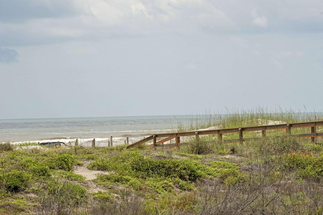 view of water feature with a beach view