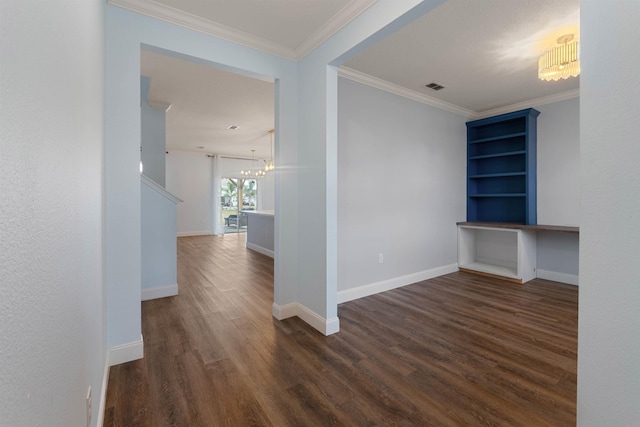 interior space with ornamental molding, visible vents, and dark wood finished floors